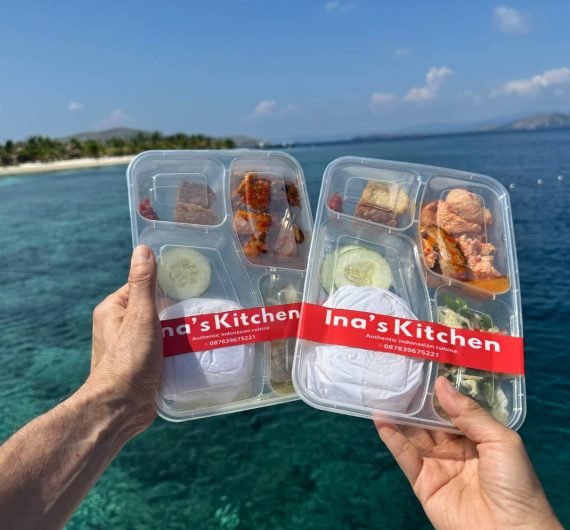 Swimming inside Rangko Cave during an adventure tour in Labuan Bajo