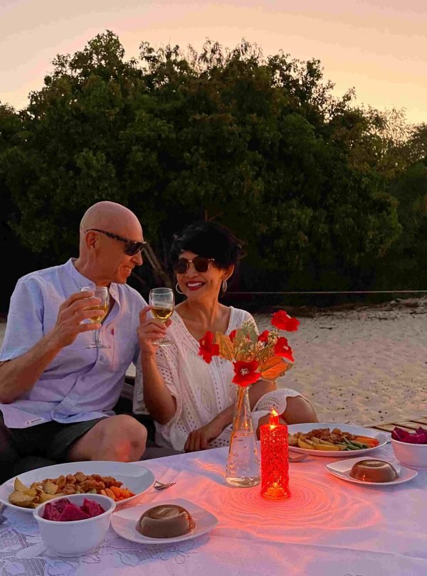 sunset dinner on beach experience with Ina’s Kitchen and Tours in Labuan Bajo
