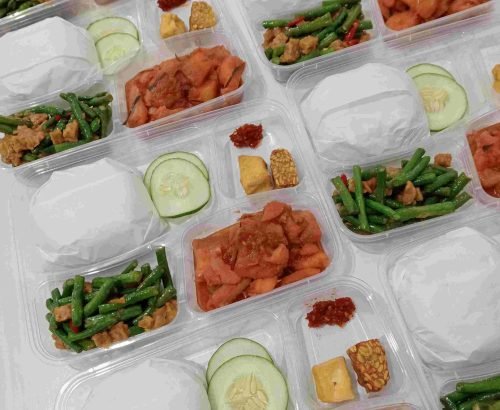 Indonesian-style meal packs prepared by Ina's Kitchen for tours and takeout