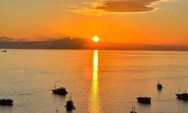 Golden sunset over the calm Flores Sea