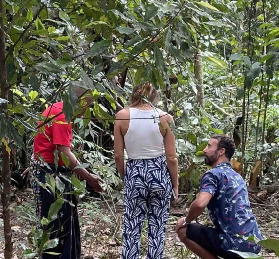 Ina's Cooking Class 7 People participating in a traditional village cooking class, surrounded by greenery and local scenery.