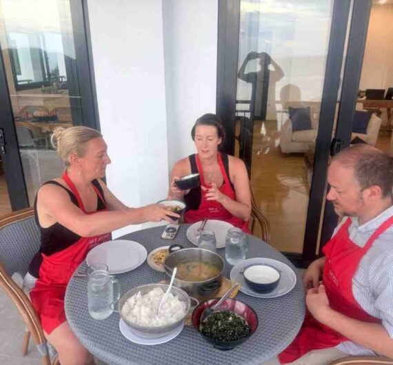 Guests enjoying a homemade meal during Ina’s cooking class in Labuan Bajo Indonesia