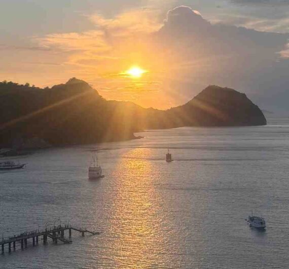 Sunset island view with boats in Labuan Bajo Indonesia near Villa Lantai