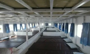Comfortable interior of a budget liveaboard cruise boat in Komodo