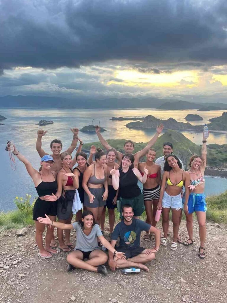 Travel group posing during a Komodo Island tour