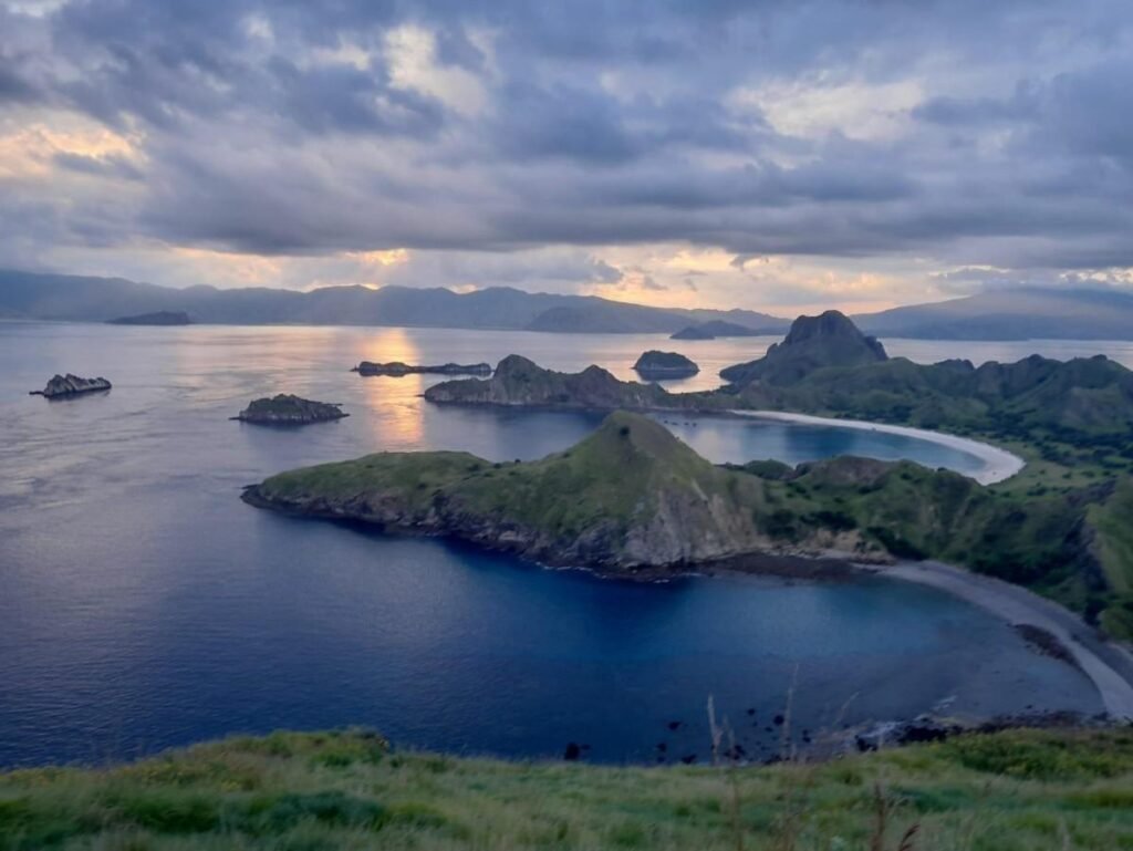 Aerial drone view of Komodo Island coastline and turquoise water
