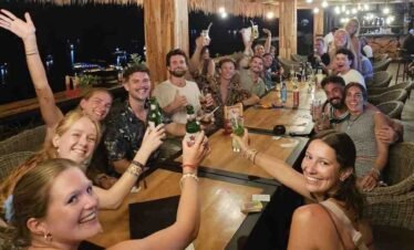 Luxury outdoor dinner setup on a Komodo cruise boat