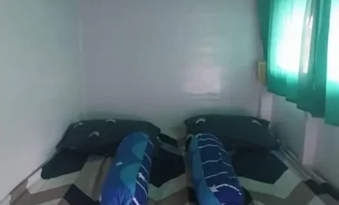 Shared lower deck cabin bed on a Komodo budget cruise