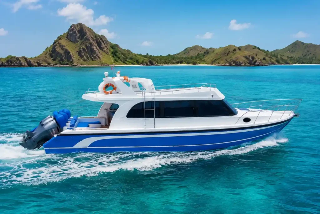Private speedboat cruising through turquoise waters near Komodo National Park from Labuan Bajo