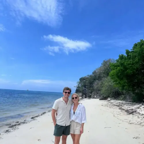 Couple enjoying a tropical beach during a private Labuan Bajo island tour