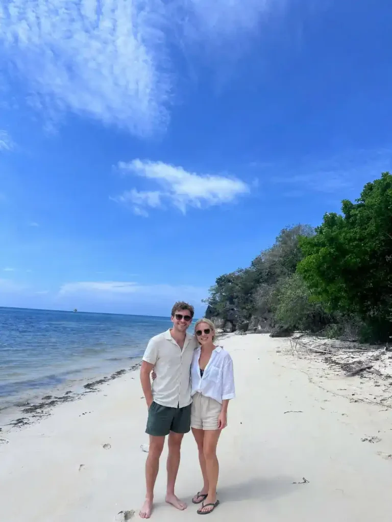 Couple enjoying a tropical beach during a private Labuan Bajo island tour