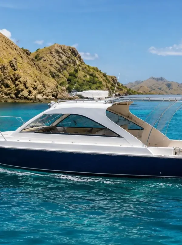 Premium private speedboat cruising through the turquoise waters near Labuan Bajo